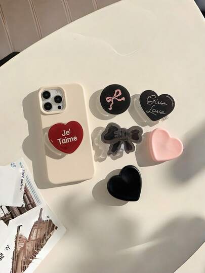 1 Adet Ayarlanabilir Katlanabilir Çok Fonksiyonlu Akrilik Yüzük, Sevimli Kalp Şeklinde Siyah Kurdele Şeklinde Çizgi Film Temalı Telefon Tutucu, Kızlar veya Kadınlar İçin Uygun, Ofis Masalarında, Ofislerde veya Ev Ortamlarında Kullanıma Uygun, Taşıması Kolay, Pratik