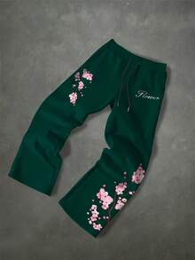 Manfinity EMRG Quần thể thao nam dáng rộng, có dây rút, họa tiết hoa, kiểu dáng thường ngày. - Màu xanh lá cây đậm - Xem 3