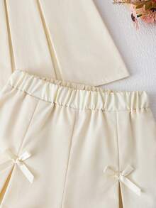 SHEIN Elladie kids Bộ đồ bé gái gồm áo vest xếp ly màu tím dễ thương có nơ trang trí, kết hợp với quần ống rộng thời trang, phù hợp cho mặc hàng ngày và đi làm, phong cách tối giản. - Màu be - Xem 5