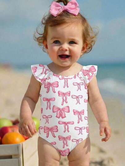 SHEIN Traje de baño de una pieza con mangas de volantes y decoración de lazo rosa para niñas, traje de baño casual y elegante, adecuado para niñas, natación, vacaciones, playa, piscina, fotografía, regalo de vacaciones de verano