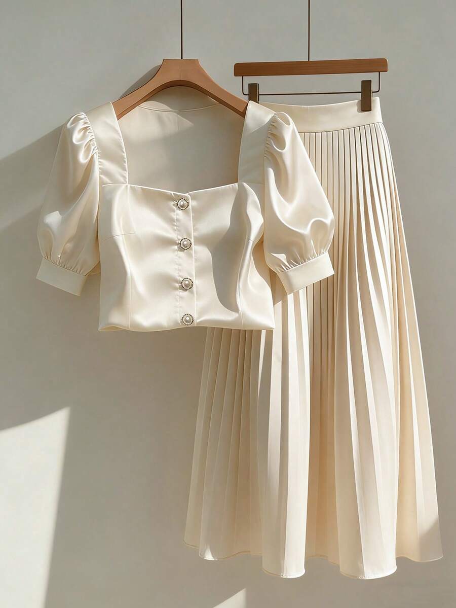 Franclia Apricot Satin Square Collar Puff Sleeve Metal Button Single-Breasted Top + Matching Pleated Maxi Skirt, Gentle Vibe Commuter 2 Pieces Set Pleated Skirt Set Skirt Sets Cream Outfit Women White Set Women French Style Clothes Cream Two Piece Set Two Piece Summer Set Skirt White Skirt And Top Set Dress Top - Apricot - View 1