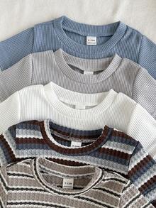 SHEIN Vintaside Kids 这款男童十件套夏季多色华夫格条纹圆领短袖T恤搭配短裤，采用焦糖棕、纯白和撞色条纹等多种配色方案。款式简约百搭，品质上乘。华夫格面料，宽松版型，多种搭配满足日常穿搭需求。适合日常上学、户外运动、居家休闲和夏季派对等场合。 - 彩色 - 查看 6