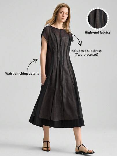 Ontre 女士黑色露肩泡泡纱拼接连衣裙，采用高端面料，现代都市商务休闲风格，适合办公室通勤、机场休闲、优雅低调奢华的邮轮度假穿着，简约百搭，四季皆宜。