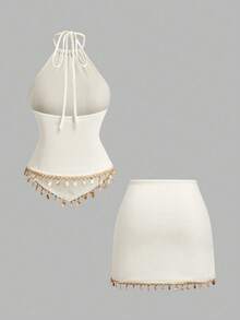 Breezaya Bộ đồ 2 món gồm áo croptop và chân váy ngắn ôm sát, chất liệu dệt kim họa tiết, có tua rua, thích hợp cho đi biển, kỳ nghỉ, lễ hội âm nhạc. - Màu be - Xem 2