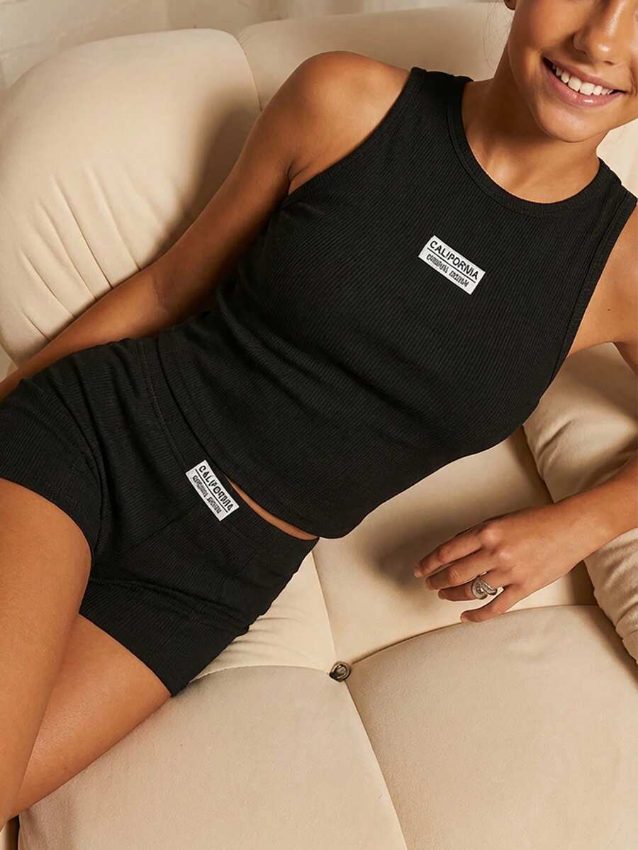 女童休闲度假黑色针织修身吊带背心，夏季细肩带上衣，柔软修身设计，适合度假、旅行、校园、日常穿着 - 黑色 - 查看 1