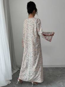 Yasmyna Đầm dài phong cách Ả Rập dáng rộng, cổ chữ V in họa tiết tương phản, tay áo xẻ tà cho nữ - Nhiều màu - Xem 2