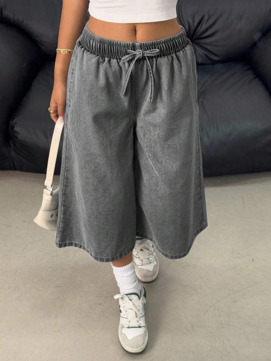SHEIN Quần jean ống rộng dáng suông, cạp chun, chất liệu denim sáng màu, kiểu dáng Y2K dành cho nữ tuổi teen, thích hợp cho kỳ nghỉ hè, đi biển, phong cách boho, đi xem hòa nhạc, lễ hội, tiệc tùng, đi nhà thờ hay lễ tốt nghiệp. - màu đen - Xem 1