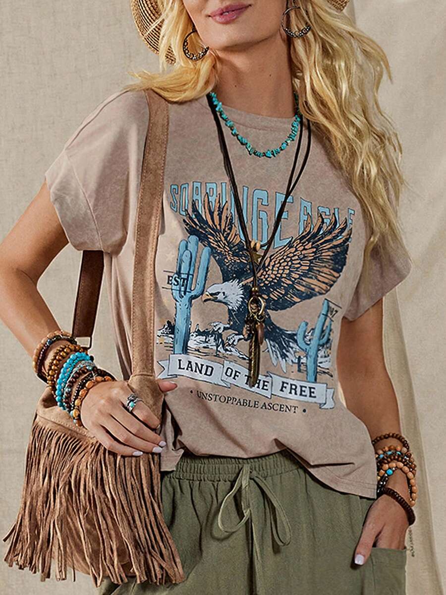 Wildy Áo thun nữ tay ngắn phong cách Boho, thích hợp cho lễ hội âm nhạc, phong cách miền Tây nước Mỹ, vintage, họa tiết bông tuyết bạc màu, thích hợp mặc hàng ngày vào mùa xuân/hè. Trang phục thường ngày, phong cách miền Tây, áo thun miền Tây, trang phục Boho cho nữ, phong cách Boho Chic cho nữ. - Lạc đà - Xem 1