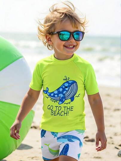 SHEIN Bubblio Young Boy Casual Fashionable Classic Cool Resort Style Shark & Dolphin Graphic, Color Block Patchwork, Text & Graphic Print Slim Fit Long Sleeve One-Piece Swimsuit, Suitable For Summer, Beach, Vacation, Swimming