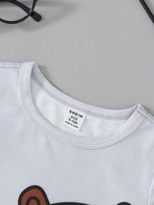 SHEIN Baby Boy Cute Cartoon Penguin Print Round Neck Short Sleeve T-Shirt And Plaid Pattern Loose Casual Pajama Pants 2pcs Set - Ginger - View 8