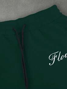 Manfinity EMRG Quần thể thao nam dáng rộng, có dây rút, họa tiết hoa, kiểu dáng thường ngày. - Màu xanh lá cây đậm - Xem 6