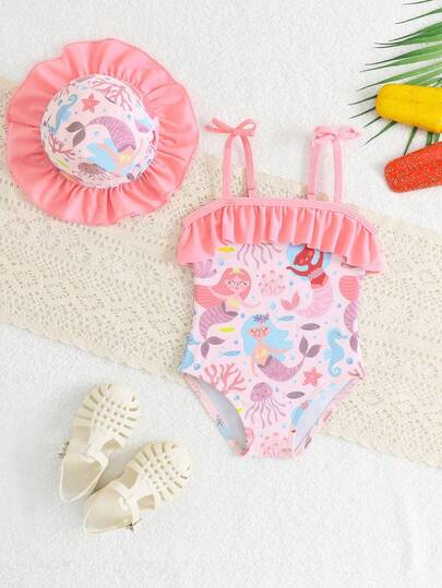 Đồ bơi liền thân cho bé gái sơ sinh, áo tắm hai mảnh có nơ, chất liệu polyester dệt kim, in kỹ thuật số, họa tiết nơ, kèm mũ, đồ bơi dễ thương kiểu đi biển cho bé gái sơ sinh.