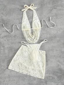 Swim SXY 这款女士欧美风性感大胆前卫的日常法式度假百搭泳衣套装，采用米白色蕾丝面料，饰以串珠配饰，系带露背吊带深V设计，搭配后背褶皱泳裤和外层蕾丝裙，三件套设计，适合春假、秋季返校季、啤酒节、音乐节、春季促销、海滩度假、春季派对、情人节等场合。 - 杏色 - 查看 2