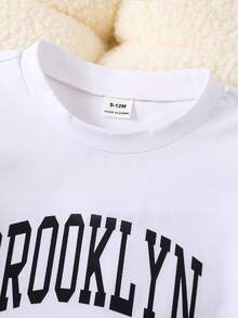 SHEIN Baby Boy Cargo Pocket Vest Set Letter Print Short Sleeve Tee & Casual Pants Black And White Autumn Street Life Casual Graphic Street Fashion Vacation - Black - View 6