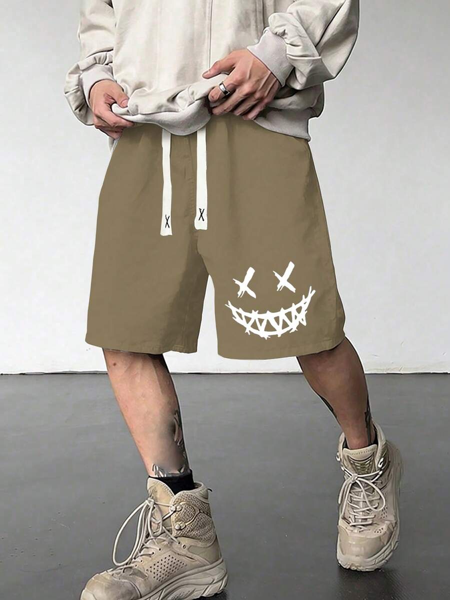 Manfinity Hypemode Pantalones cortos sueltos para hombres con estampado de expresión y cintura con cordón - Caqui - Ver 1