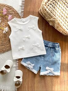SHEIN Baby Mädchen süßer Prinzessinen-Stil ärmelloses Top mit Schleifen-Dekor und passende Shorts, figurbetonter Schnitt, geeignet für tägliche Ausflüge, Familienfeiern, Geburtstagsfeiern, Freizeitaktivitäten und Fotoshootings - Aprikosenfarben - Übersicht 1