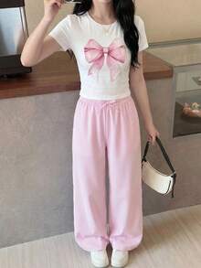 SHEIN 少女时尚针织蝴蝶结印花休闲修身短袖T恤和宽松条纹裤套装，春夏款 - 彩色 - 查看 9