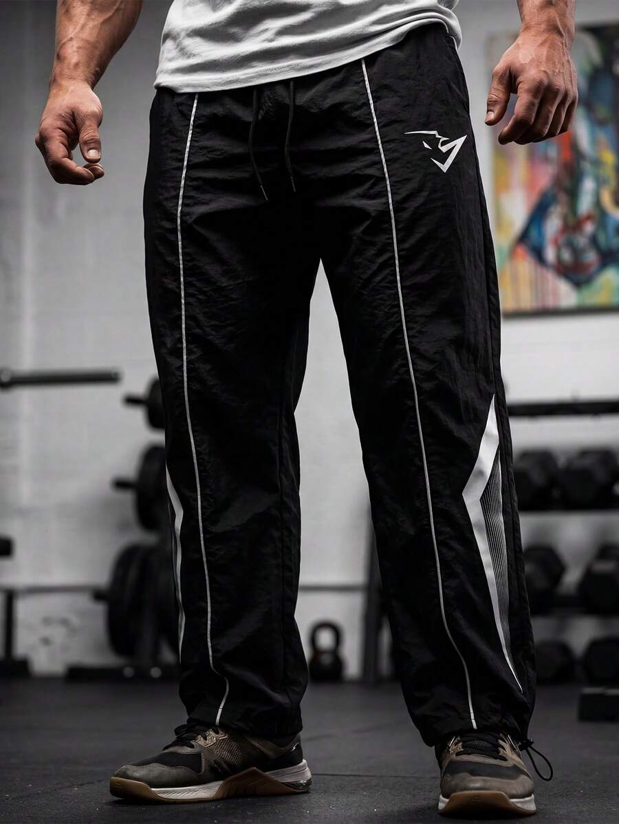 GymBeat Men's Geometric Print Woven Sports Pants - Black - View 1