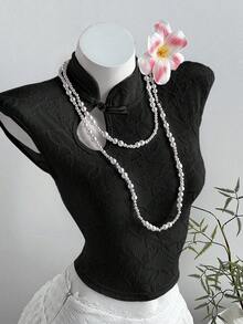 Elamini 女士粉色纹理新款中国风镂空水滴领露胸纽扣设计弹力腰修身短袖针织连衣裙T恤，适合休闲、度假、通勤等场合。 - 黑色 - 查看 4