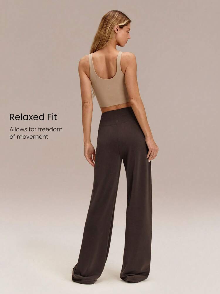Pantalon ample de détente à taille haute avec poches latérales, en modal SoftSerene doux, soyeux, lisse et respirant. Idéal pour le port quotidien et décontracté.