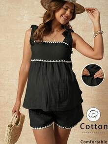 SHEIN Trang phục mùa hè, Quần áo bà bầu, Bộ đồ bầu 2 mảnh, Bộ áo hai dây và quần short phối màu tương phản cho bà bầu, Bộ đồ đi nghỉ mát hai mảnh bằng cotton kiểu Bohemian màu đen dành cho phụ nữ mang thai, với thiết kế phối màu tương phản và cạp chun co giãn thoải mái không gây khó chịu cho bụng bầu. Bộ đồ đi nghỉ mát cho nữ, Bộ đồ mùa hè phối hợp cho nữ, Trang phục nghỉ mát mùa hè cho nữ, Trang phục cotton cho nữ, Bộ đồ mùa hè phối hợp cho nữ, Trang phục mùa hè 2 mảnh dễ thương cho nữ, Trang phục mùa hè mới về cho nữ, Váy thường ngày cho nữ, Trang phục nghỉ mát mùa hè cho nữ, Váy đi nghỉ mát cho nữ, Váy mới về cho nữ, Váy dã ngoại thường ngày cho nữ, Trang phục du thuyền cho nữ, Váy chống nắng thường ngày, Bộ quần short thường ngày cho nữ, Trang phục nghỉ mát cho nữ, Trang phục du thuyền cho nữ, Trang phục mùa hè thường ngày cho nữ, Trang phục mùa hè thường ngày cho nữ, Trang phục thường ngày cho nữ, Bộ đồ hai mảnh quần short cho nữ, Bộ đồ cotton thoải mái mùa hè, Trang phục đi biển cho nữ - màu đen - Xem 3
