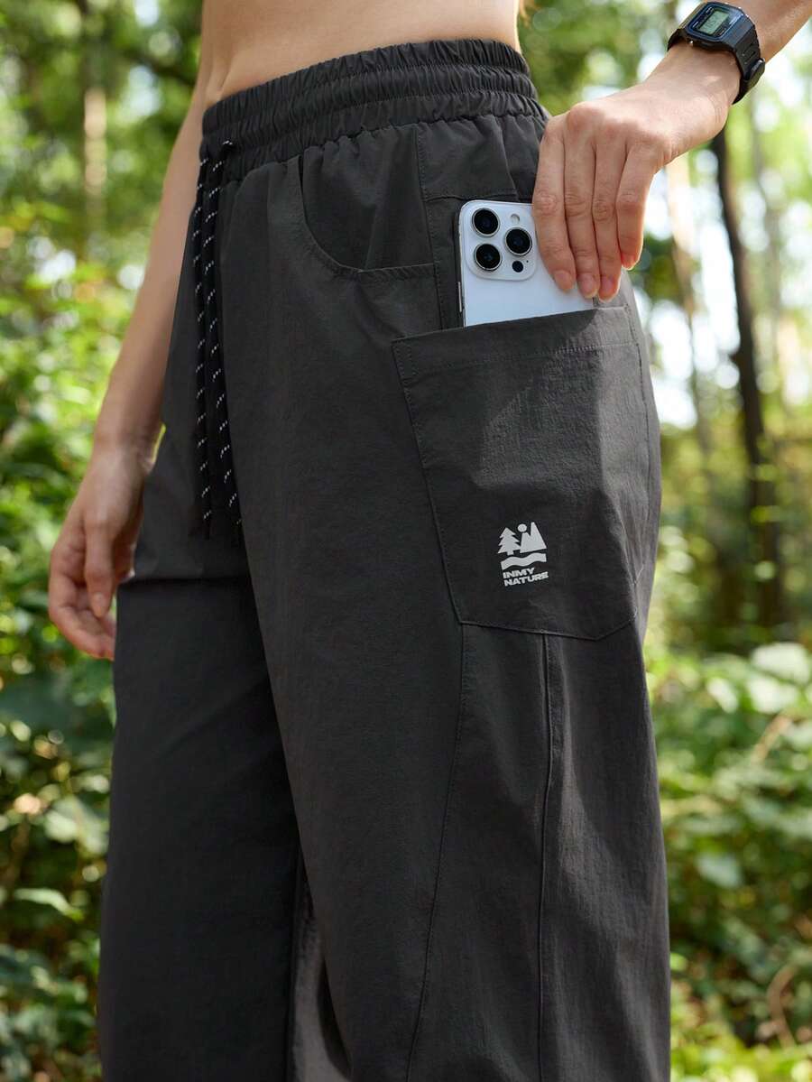 SHEIN In My Nature Quần nữ cạp chun có dây rút, kiểu dáng thường ngày đa năng, phù hợp cho hoạt động ngoài trời và leo núi. - Màu xám đen - Xem 1