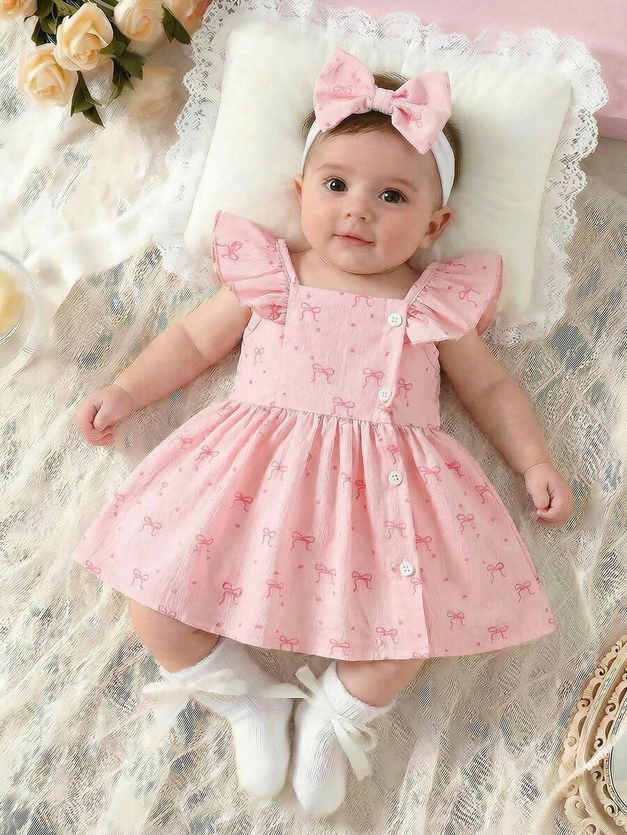 SHEIN Bộ 2 món váy và băng đô không tay in họa tiết hoa màu nước cho bé gái, trang phục sơ sinh với nơ trang trí, thiết kế mở phía trước tiện lợi, phù hợp cho bé từ 0-9 tháng tuổi, dự tiệc, mặc hàng ngày, mềm mại và thoải mái, sản phẩm mới mùa hè 2026. - Màu Hồng baby - Xem 1