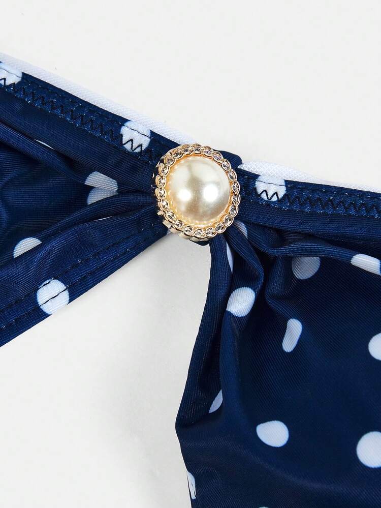 Navy Blue Polka Dot Strapless Swimsuit With Cut Out Detail And Pearl Buttons Spring Summer Chic Swimwear Polkadot Beachwear French Style Parisian Style
