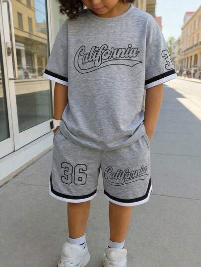 SHEIN Set de 2 piezas de parte superior de manga corta y pantalones cortos casuales, sueltos y cómodos con estampado versátil y decoración de cinta de contraste para niño preadolescente, adecuado para la escuela, salidas, deportes, fiestas, ocio en el hogar, primavera/verano