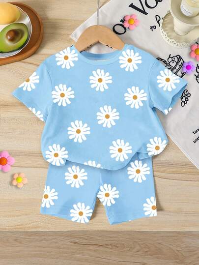 SHEIN 2 piezas Conjunto de camiseta de manga corta con cuello redondo y estampado de flores de margarita, y shorts ajustados de punto para niñas, estilo casual y dulce para vacaciones. Conjunto de camiseta cómoda para niñas, atuendo diario de verano