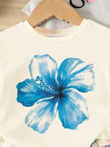 SHEIN 两件套女童休闲芙蓉花、海洋生物、贝壳、蝴蝶结印花宽松圆领短袖T恤和修身骑行短裤套装，适合春夏、休闲、海滩、周末穿着，可爱夏日女童装，韩版风格，夏季外套，女童夏季服装，女童贝壳套装，女童沙滩套装 - 彩色 - 查看 4