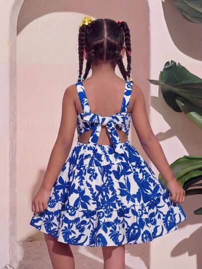 女童夏季碎花吊带连衣裙，多层A字裙摆，公主风，柔软面料，甜美东方风情，适合日常穿着、旅行和拍照。