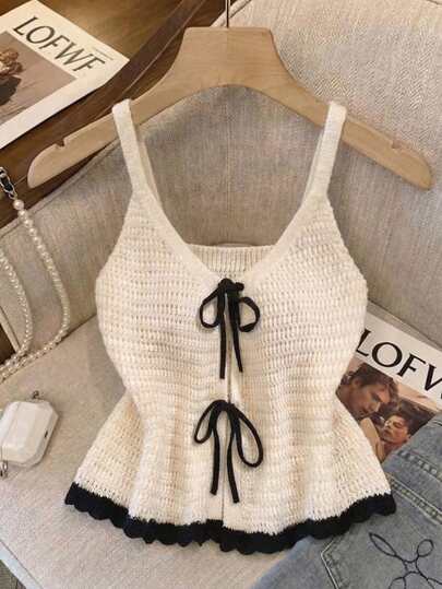 Franclia Women's Knitted Top With A Bow Tie, Ruffled Hem, V-Neck, Fitted Waist, And Contrasting Black Trim. Suitable For Summer, Outings, Beach, Vacations, Spring, Casual Summer, Knitwear, Work, And French Style. Features A Bow Tie At The Front.Graduation Season Attire, Fashionable Casual Commuter Wear, Business Office Wear, Versatile And Stylish Everyday Casual Wear, Urban Teacher's Professional Attire