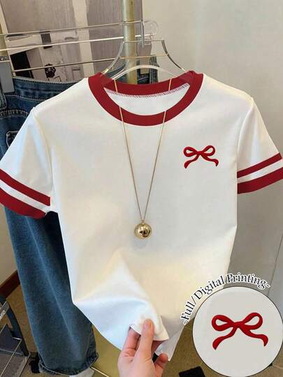 1 pièce Hauts d'été pour adolescentes, T-shirt à manches courtes ajusté avec col rond et imprimé papillon avec bordure contrastée. Ensemble de t-shirts d'été pour adolescentes. Convient pour les hauts mignons, t-shirt graphique papillon