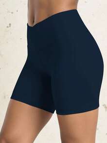 Quần short biker cạp cao dành cho nữ tuổi teen, thiết kế chéo, màu trơn, chất liệu co giãn 4 chiều không lộ nội y, thích hợp cho chạy bộ, đạp xe và tập luyện. - Màu xanh hải quân - Xem 3