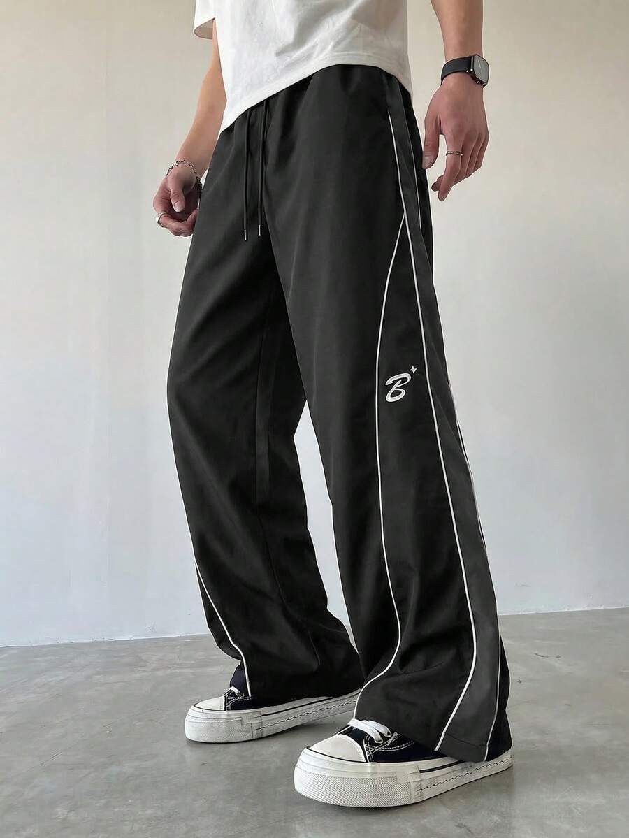 Manfinity Hypemode Men's Patchwork Contrast Trim Graphic Print Loose Casual Pants With Slant Pockets - Black - View 1