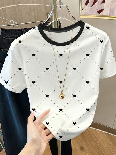 Resyla Camiseta de mujer con cuello redondo, estampado de corazones y lunares, y bloques de color