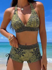 Swim Lushoire Bộ bikini hai mảnh thanh lịch và sang trọng dành cho nữ, kiểu dáng nghỉ dưỡng, gồm áo hai dây cổ chữ V với họa tiết cây nhiệt đới và các mảng màu đen được viền bằng ruy băng lụa vàng, kết hợp với quần bơi boxer kín đáo có dây rút. Hoàn hảo cho kỳ nghỉ, lý tưởng cho kỳ nghỉ xuân, mùa tựu trường, các ngày lễ, các chương trình khuyến mãi mùa xuân và các hoạt động giải trí trên bãi biển. - Nhiều màu - Xem 1