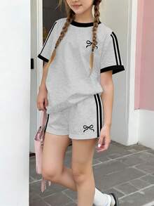 两件套少女休闲蝴蝶结条纹短袖T恤短裤套装，适合夏季和秋季穿着，舒适透气，适合秋季叠穿，时尚百搭，休闲百搭，儿童印花服装，返校季、秋季服装、返校节服装，佐伊套装，少女套装，夏季清凉少女套装，女童服装，少女服装，两件套 - 彩色 - 查看 2