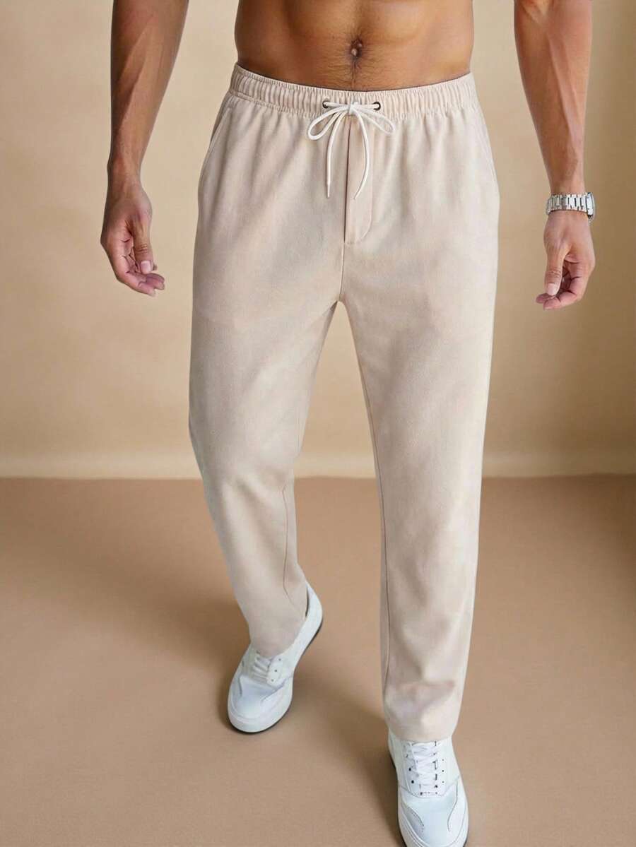 Manfinity Homme Men's Solid Color Drawstring Waist Pocket Tapered Casual Pants Beige Pants For Men Cream Joggers Men Men Drawstring Pants Men's Linen Bottoms Cream Pants Men Summeroutfit Mens Beige Pants Mens Textured Pants Mens Sweatpants Drawstring Lounge Pants Men Mens Cream Colored Pants Mens Casual Trousers Working Trousers Men Mens Relaxed Fit Pants Mens Summer Pants Pants For Men Casual Mens Regular Fit Pants Mens Draw-String Pants - Apricot - View 1