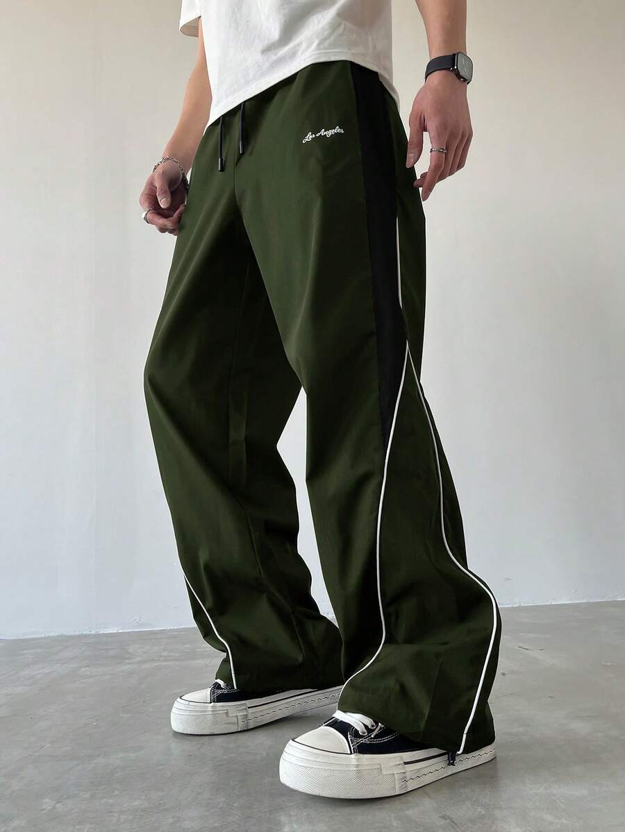 Manfinity EMRG Men's Casual Color Block Drawstring Straight Leg Pants, Loose Fit Long Black Patchwork Straight Leg Sweatpants For Outdoor - Army Green - View 1