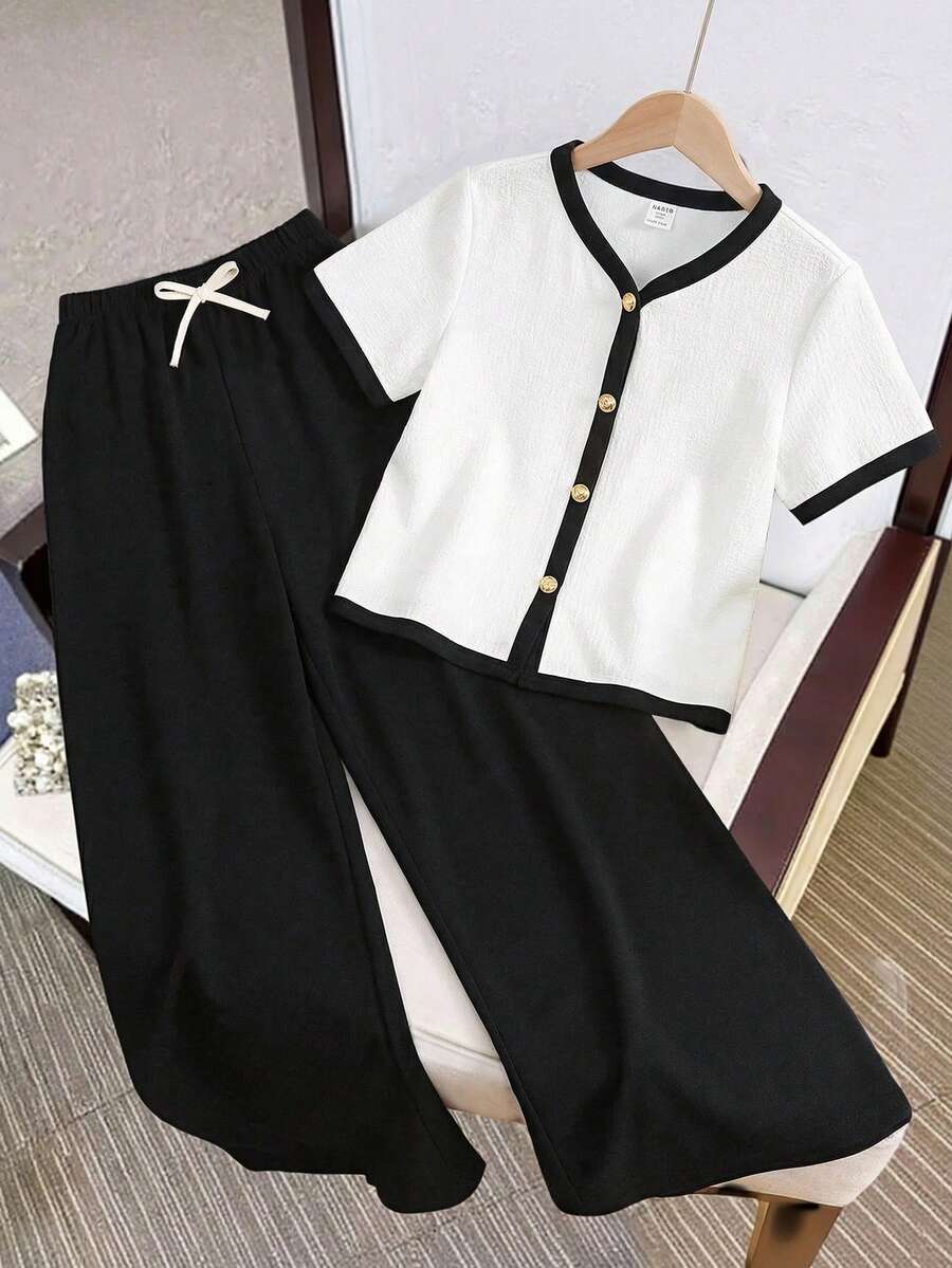 SHEIN 2 piezas Conjunto de niña preadolescente con camisa de cuello en V de color contrastante de manga corta y pantalones casuales - Multicolor - Ver 1