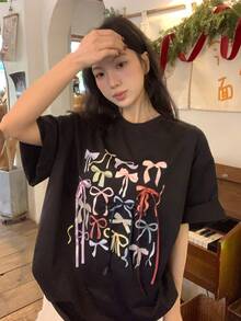 DAZY Women's Bow Print Round Neck Short Sleeve Casual T-Shirt - Black - View 3