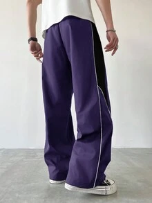 Manfinity EMRG Pantalon droit décontracté pour hommes avec cordon de serrage et blocs de couleurs, pantalon de survêtement droit ample et patchwork noir pour le football en extérieur - Prune - Voir 2