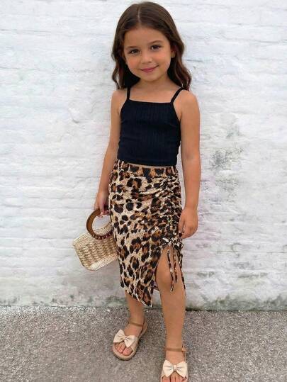 SHEIN 2pcs Young Girl Bohemela Knitted Solid Color Camisole Top And Ditsy Leopard Print Casual Skirt Set Toddler Girl Animal Print Girls Leopard Outfit Cheetah Print Skirt Tween Girls Cheetah Print Outfit Young Girl Chic Leopard Print Skirt With Adjustable Side Ruched Detail Fashionable Midi Length Squishy
