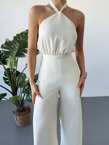 Firerie Bộ jumpsuit nữ thanh lịch với dây đeo vai mảnh và dây buộc phía sau, dáng rộng. - Màu be - Xem 8