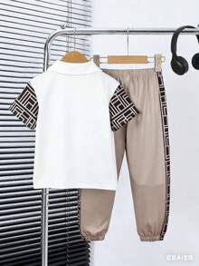 SHEIN Streecool Kids 男童休闲Polo衫套装（2件套），上衣采用撞色拼接设计，并饰有织唛，裤子采用撞色锥形裤腿设计，面料舒适，适合夏秋穿着。 - 彩色 - 查看 2
