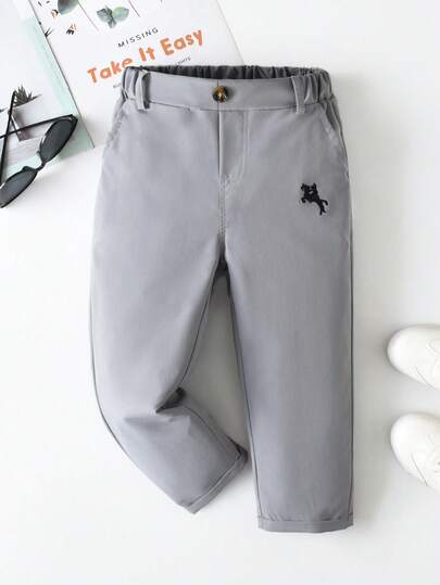 SHEIN Young Boy's Casual Comfortable Solid Color Pants, With Single Button Decor And Slant Pockets, Elastic Waist Design, Suitable For Daily Wear, Travel, Party, Holiday, Versatile Fashion