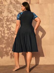 Swim Mulvari Plus Size Women 2pcs/Set Random Print Half Sleeve Zipper Front Loose Split Dress With Solid Color Shorts Swimwear Set - Black - View 2
