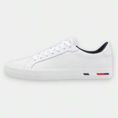  Tenis Casuales de Piel Minimalistas para Hombre Tommy Hilfiger - Sneakers Urbanos Blancos con Logotipo en Relieve y Detalle de Bandera Icónica en la Suela